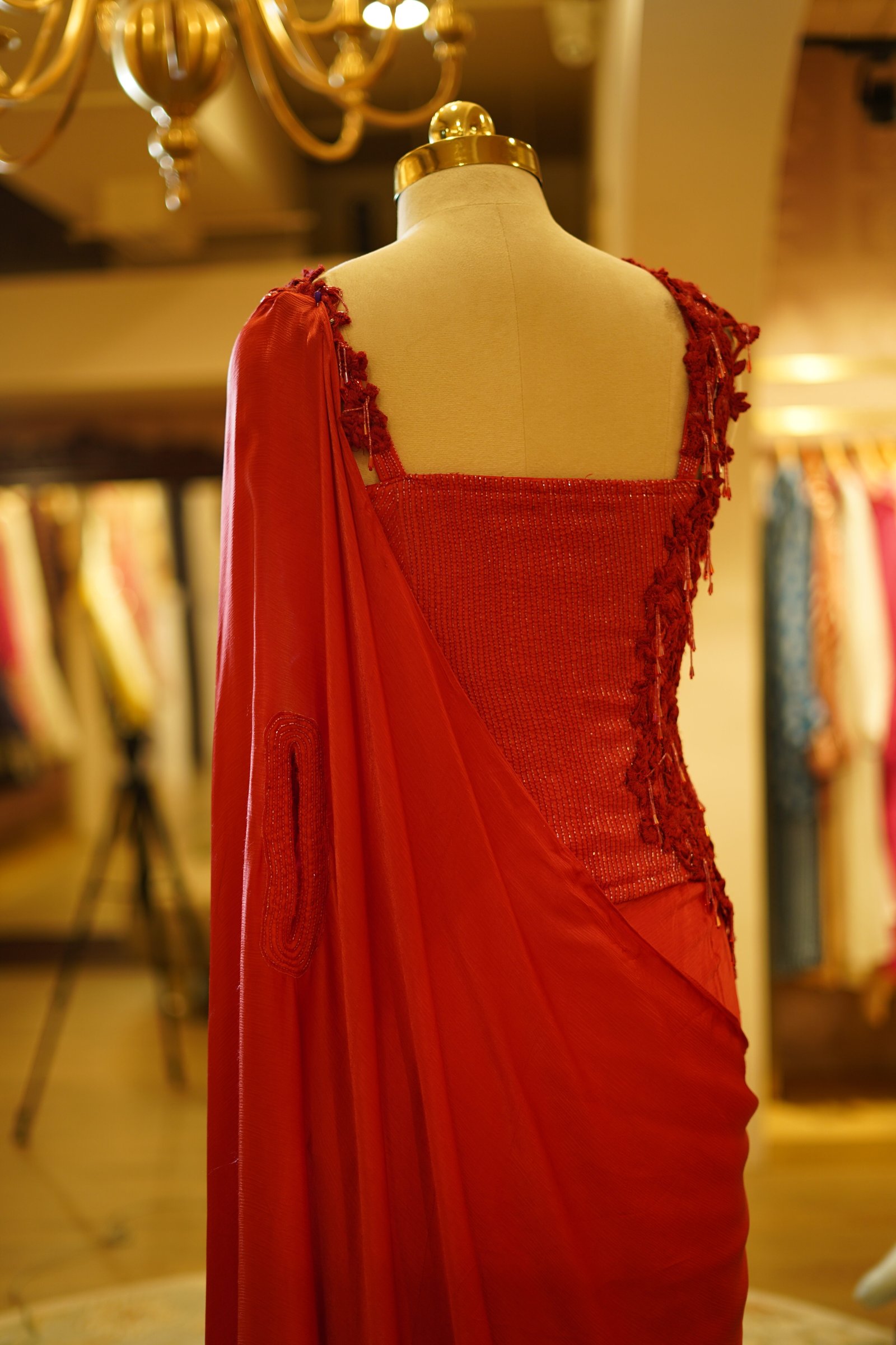 Red Drape Saree with Handwork Corset Blouse